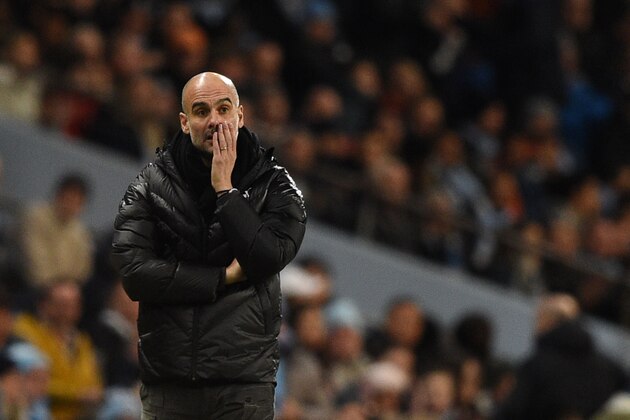 Manchester City's Spanish manager Pep Guardiola reacts on the touchline during the English Premier League football match between Manchester City and Manchester United at the Etihad Stadium in Manchester, north west England, on December 7, 2019. (Photo by Oli SCARFF / AFP) / RESTRICTED TO EDITORIAL USE. No use with unauthorized audio, video, data, fixture lists, club/league logos or 'live' services. Online in-match use limited to 120 images. An additional 40 images may be used in extra time. No video emulation. Social media in-match use limited to 120 images. An additional 40 images may be used in extra time. No use in betting publications, games or single club/league/player publications. /  (Photo by OLI SCARFF/AFP via Getty Images)