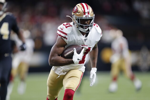 San Francisco 49ers running back Raheem Mostert (31) carries in the first half an NFL football game against the New Orleans Saints in New Orleans, Sunday, Dec. 8, 2019. (AP Photo/Brett Duke)