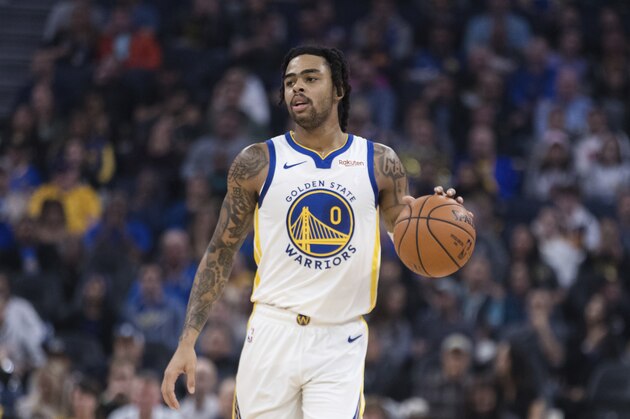 Golden State Warriors guard D'Angelo Russell dribbles against the Utah Jazz in the first half of an NBA basketball game in San Francisco, Monday, Nov. 11, 2019. (AP Photo/John Hefti)