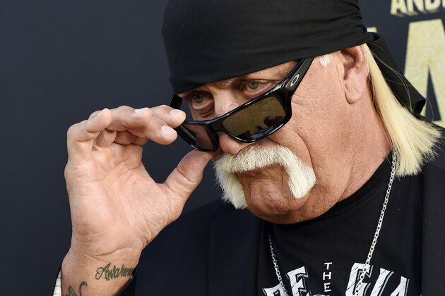 Professional wrestler Hulk Hogan poses for photographers at the premiere of the HBO documentary film