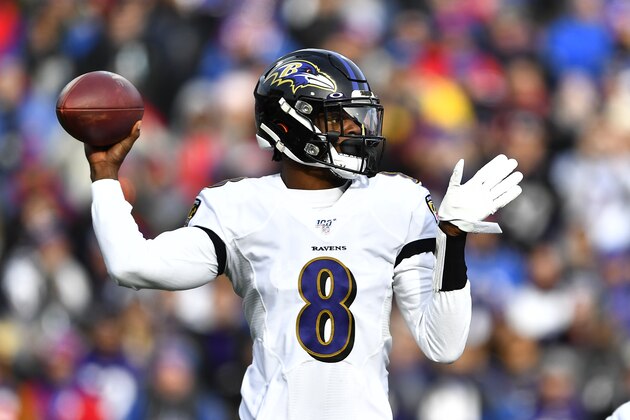 Baltimore Ravens quarterback Lamar Jackson looks to pass during the first half of an NFL football game against the Buffalo Bills in Orchard Park, N.Y., Sunday, Dec. 8, 2019. (AP Photo/Adrian Kraus)
