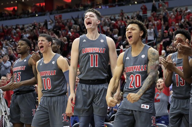LOUISVILLE, KENTUCKY - DECEMBER 06:  Samuell Wiliiamson #10, Quinn Slazinski #11 and Josh Nickelberry #20 of the Louisville Cardinals celebrate during the game against the Pittsburgh Panthers at KFC YUM! Center on December 06, 2019 in Louisville, Kentucky. (Photo by Andy Lyons/Getty Images)