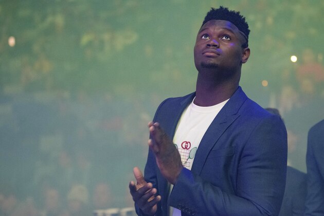 New Orleans Pelicans forward Zion Williamson waits for the team's NBA basketball game against the Toronto Raptors in New Orleans, Friday, Nov. 8, 2019. (AP Photo/Matthew Hinton)