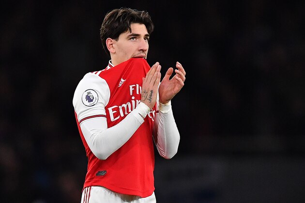 Arsenal's Spanish defender Hector Bellerin applauds the fans following the English Premier League football match between Arsenal and Brighton and Hove Albion at the Emirates Stadium in London on December 5, 2019. - Brighton won the match 2-1. (Photo by Ben STANSALL / AFP) / RESTRICTED TO EDITORIAL USE. No use with unauthorized audio, video, data, fixture lists, club/league logos or 'live' services. Online in-match use limited to 120 images. An additional 40 images may be used in extra time. No video emulation. Social media in-match use limited to 120 images. An additional 40 images may be used in extra time. No use in betting publications, games or single club/league/player publications. /  (Photo by BEN STANSALL/AFP via Getty Images)