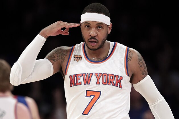FILE - In this March 27, 2017, file photo, New York Knicks forward Carmelo Anthony (7) reacts after hitting a 3-point shot against the Detroit Pistons during the second quarter of an NBA basketball game in New York. The Knicks agreed to trade Anthony to the Thunder on Saturday, Sept. 23, 2017, saving themselves a potentially awkward reunion next week with the player they'd been trying to deal since last season.  New York will get Enes Kanter, Doug McDermott and a draft pick, a person with knowledge of the deal said. The person spoke with The Associated Press on condition of anonymity because the trade had not been announced.  (AP Photo/Julie Jacobson, File)