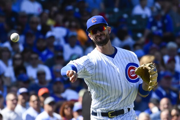 Chicago Cubs third baseman Kris Bryant (17) thirds to first base during a baseball game against the San Francisco Giants Thursday, Aug. 22, 2019, in Chicago. (AP Photo/Matt Marton)