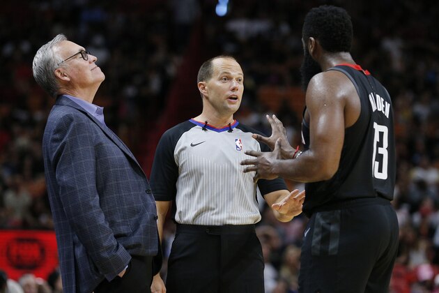 MIAMI, FLORIDA - OCTOBER 18:  Head coach Mike D'Antoni and James Harden #13 of the Houston Rockets react to a foul call by referee John Goble #30 against the Miami Heat during the second half at American Airlines Arena on October 18, 2019 in Miami, Florida. NOTE TO USER: User expressly acknowledges and agrees that, by downloading and or using this photograph, User is consenting to the terms and conditions of the Getty Images License Agreement. (Photo by Michael Reaves/Getty Images)
