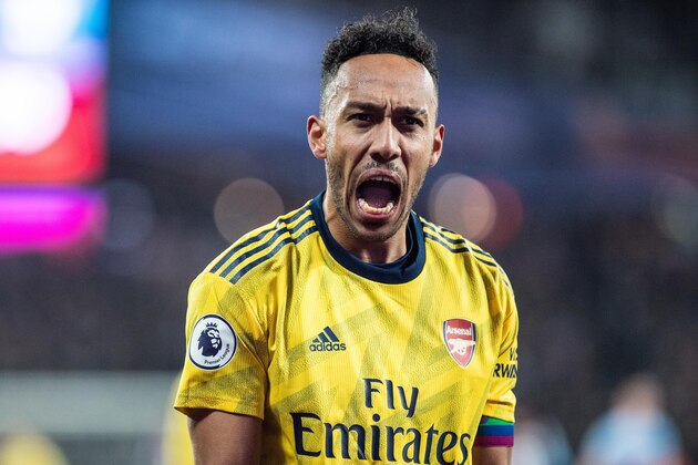 LONDON, ENGLAND - DECEMBER 09: Pierre-Emerick Aubameyang of Arsenal FC celebrates after scoring his team's third goal during the Premier League match between West Ham United and Arsenal FC at London Stadium on December 9, 2019 in London, United Kingdom. (Photo by Sebastian Frej/MB Media/Getty Images)