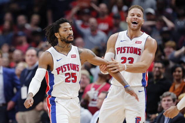Detroit Pistons guard Derrick Rose (25) celebrates the game winning score with forward Blake Griffin (23) in the second half of an NBA basketball game in New Orleans, Monday, Dec. 9, 2019. (AP Photo/Brett Duke)