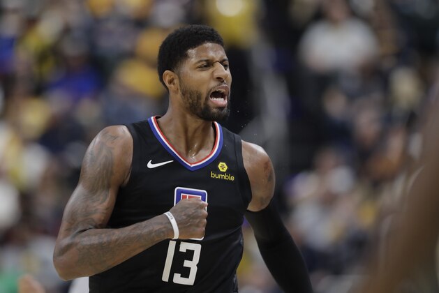 Los Angeles Clippers forward Paul George reacts after hitting a shot during the second half of an NBA basketball game against the Indiana Pacers, Monday, Dec. 9, 2019, in Indianapolis. The Clippers won 110-99. (AP Photo/Darron Cummings)