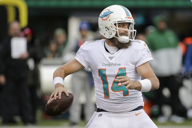 Miami Dolphins quarterback Ryan Fitzpatrick (14) passes against the New York Jets during the fourth quarter of an NFL football game, Sunday, Dec. 8, 2019, in East Rutherford, N.J. (AP Photo/Seth Wenig)
