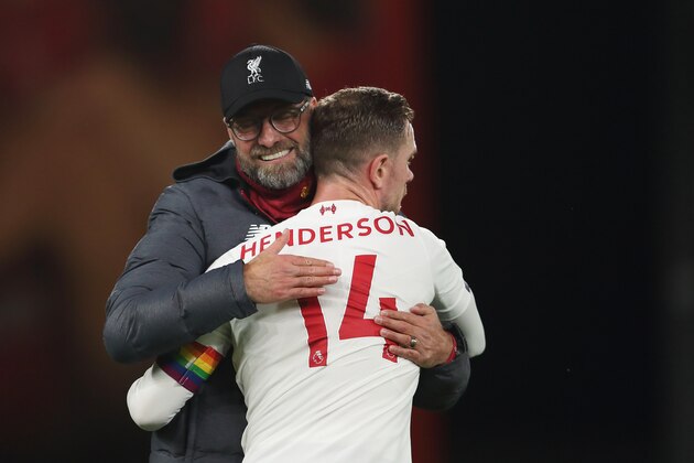 BOURNEMOUTH, ENGLAND - DECEMBER 07: Liverpool manager / head coach Jurgen Klopp and Jordan Henderson of Liverpool at full time of the Premier League match between AFC Bournemouth and Liverpool FC at Vitality Stadium on December 7, 2019 in Bournemouth, United Kingdom. (Photo by James Williamson - AMA/Getty Images)
