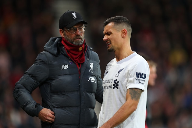 BOURNEMOUTH, ENGLAND - DECEMBER 07: Jurgen Klopp manager of Liverpool with an injured Dejan Lovren of Liverpool during the Premier League match between AFC Bournemouth and Liverpool FC at Vitality Stadium on December 07, 2019 in Bournemouth, United Kingdom. (Photo by Catherine Ivill/Getty Images)