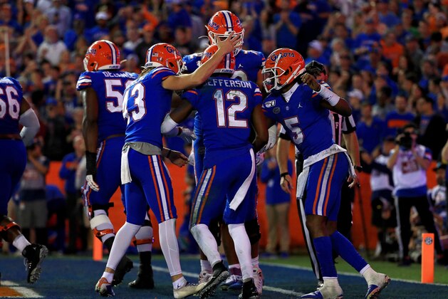 GAINESVILLE, FLORIDA - NOVEMBER 30: Van Jefferson #12 of the Florida Gators celebrates a touchdown during a game against the Florida State Seminoles at Ben Hill Griffin Stadium on November 30, 2019 in Gainesville, Florida. (Photo by Mike Ehrmann/Getty Images)