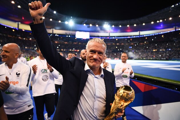 France's coach Didier Deschamps holds the 2018 World Cup trophy as he celebrates during a ceremony for the victory of the 2018 World Cup at the end of the UEFA Nations League football match between France and Netherlands at the Stade de France stadium, in Saint-Denis, northern of Paris, on September 9, 2018. (Photo by FRANCK FIFE / AFP)        (Photo credit should read FRANCK FIFE/AFP via Getty Images)