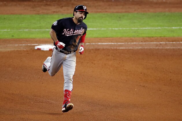 HOUSTON, TEXAS - OCTOBER 30:  Anthony Rendon #6 of the Washington Nationals hits a solo home run against the Houston Astros during the seventh inning in Game Seven of the 2019 World Series at Minute Maid Park on October 30, 2019 in Houston, Texas. (Photo by Tim Warner/Getty Images)