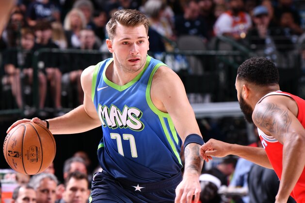 DALLAS, TX - DECEMBER 8: Luka Doncic #77 of the Dallas Mavericks handles the ball against the Sacramento Kings on December 8, 2019 at the American Airlines Center in Dallas, Texas. NOTE TO USER: User expressly acknowledges and agrees that, by downloading and or using this photograph, User is consenting to the terms and conditions of the Getty Images License Agreement. Mandatory Copyright Notice: Copyright 2019 NBAE (Photo by Glenn James/NBAE via Getty Images)