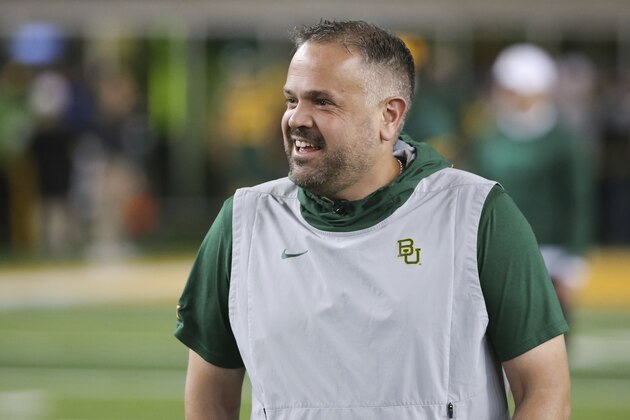 Baylor head coach Matt Rhule stands on the field prior to an NCAA college football game against Oklahoma in Waco, Texas, Saturday, Nov. 16, 2019. (AP Photo/Ray Carlin)