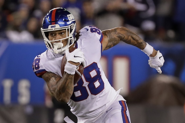 New York Giants tight end Evan Engram (88) runs the ball against the Dallas Cowboys during the second quarter of an NFL football game, Monday, Nov. 4, 2019, in East Rutherford, N.J. (AP Photo/Adam Hunger)
