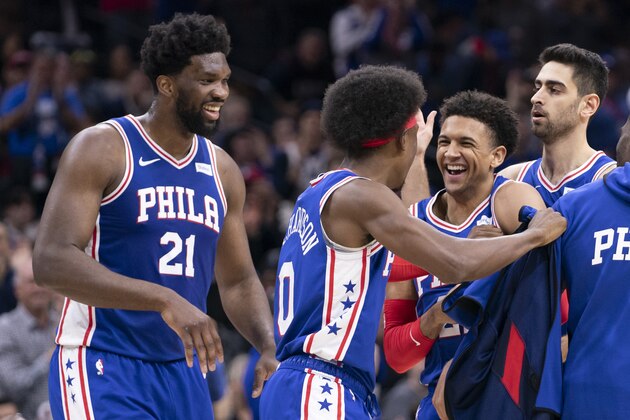 PHILADELPHIA, PA - DECEMBER 10: Joel Embiid #21, Josh Richardson #0, Matisse Thybulle #22 and Furkan Korkmaz #30 of the Philadelphia 76ers react during a timeout in the second quarter against the Denver Nuggets at the Wells Fargo Center on December 10, 2019 in Philadelphia, Pennsylvania. NOTE TO USER: User expressly acknowledges and agrees that, by downloading and/or using this photograph, user is consenting to the terms and conditions of the Getty Images License Agreement. (Photo by Mitchell Leff/Getty Images)