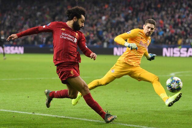 SALZBURG, AUSTRIA - DECEMBER 10: Mohamed Salah of Liverpool scores his team's second goal  during the UEFA Champions League group E match between RB Salzburg and Liverpool FC at Red Bull Arena on December 10, 2019 in Salzburg, Austria. (Photo by Michael Regan/Getty Images)