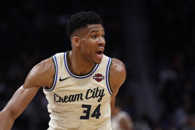 Milwaukee Bucks forward Giannis Antetokounmpo plays during the first half of an NBA basketball game against the Detroit Pistons, Wednesday, Dec. 4, 2019, in Detroit. (AP Photo/Carlos Osorio)