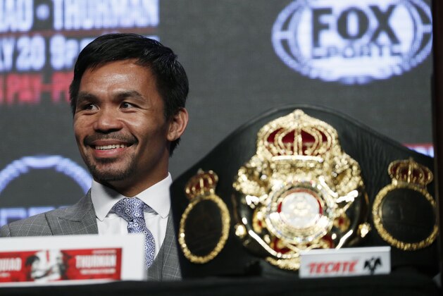 Manny Pacquiao smiles during a news conference Wednesday, July 17, 2019, in Las Vegas. Pacquiao is scheduled to fight Keith Thurman in a welterweight championship boxing match Saturday in Las Vegas. (AP Photo/John Locher)