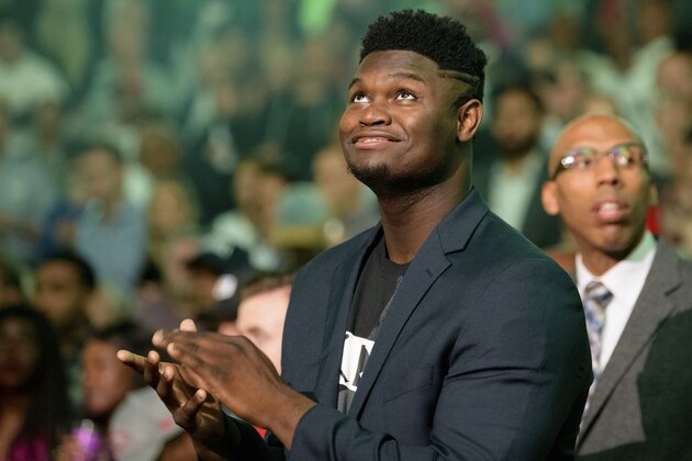 New Orleans Pelicans forward Zion Williamson watches waits for the team's NBA basketball game against the Los Angeles Lakers in New Orleans, Wednesday, Nov. 27, 2019. (AP Photo/Matthew Hinton)