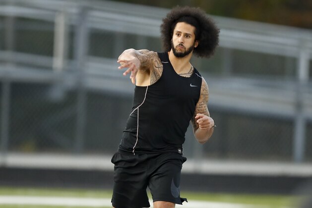 Free agent quarterback Colin Kaepernick participates in a workout for NFL football scouts and media, Saturday, Nov. 16, 2019, in Riverdale, Ga. (AP Photo/Todd Kirkland)