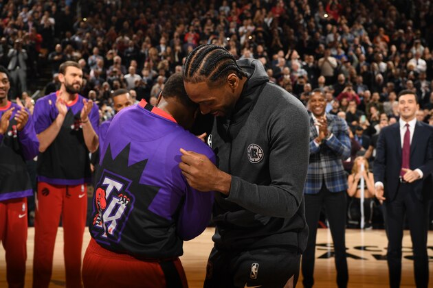 TORONTO, CANADA - DECEMBER 11: Kyle Lowry #7 of the Toronto Raptors and Kawhi Leonard #2 of the LA Clippers hug prior to a game on December 11, 2019 at the Scotiabank Arena in Toronto, Ontario, Canada.  NOTE TO USER: User expressly acknowledges and agrees that, by downloading and or using this Photograph, user is consenting to the terms and conditions of the Getty Images License Agreement.  Mandatory Copyright Notice: Copyright 2019 NBAE (Photo by Ron Turenne/NBAE via Getty Images)