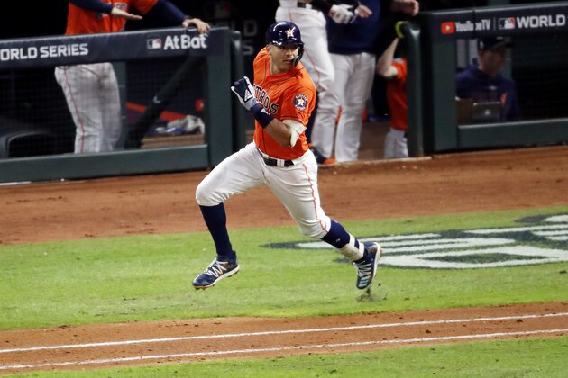 HOUSTON, TEXAS - OCTOBER 30:  Carlos Correa #1 of the Houston Astros hits an RBI single against the Washington Nationals during the fifth inning in Game Seven of the 2019 World Series at Minute Maid Park on October 30, 2019 in Houston, Texas. (Photo by Tim Warner/Getty Images)