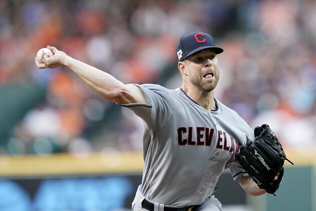 Cleveland Indians starting pitcher Corey Kluber throws against the Houston Astros during the first inning of a baseball game Friday, April 26, 2019, in Houston. (AP Photo/David J. Phillip)