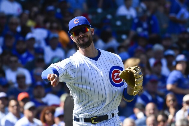 Chicago Cubs third baseman Kris Bryant (17) thirds to first base during a baseball game against the San Francisco Giants Thursday, Aug. 22, 2019, in Chicago. (AP Photo/Matt Marton)