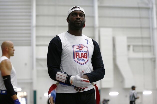 Florida Fury's Michael Vick walk the sideline during game against Fighting Cancer during the American Flag Football League Tournament Sunday, June 16, 2019 in Florham Park, N.J. (Adam Hunger/AP Images for the American Flag Football League)