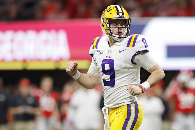 ATLANTA, GEORGIA - DECEMBER 07: Joe Burrow #9 of the LSU Tigers celebrates after throwing a touchdown pass to Terrace Marshall Jr. #6 (not pictured) in the third quarter against the Georgia Bulldogs during the SEC Championship game at Mercedes-Benz Stadium on December 07, 2019 in Atlanta, Georgia. (Photo by Kevin C. Cox/Getty Images)
