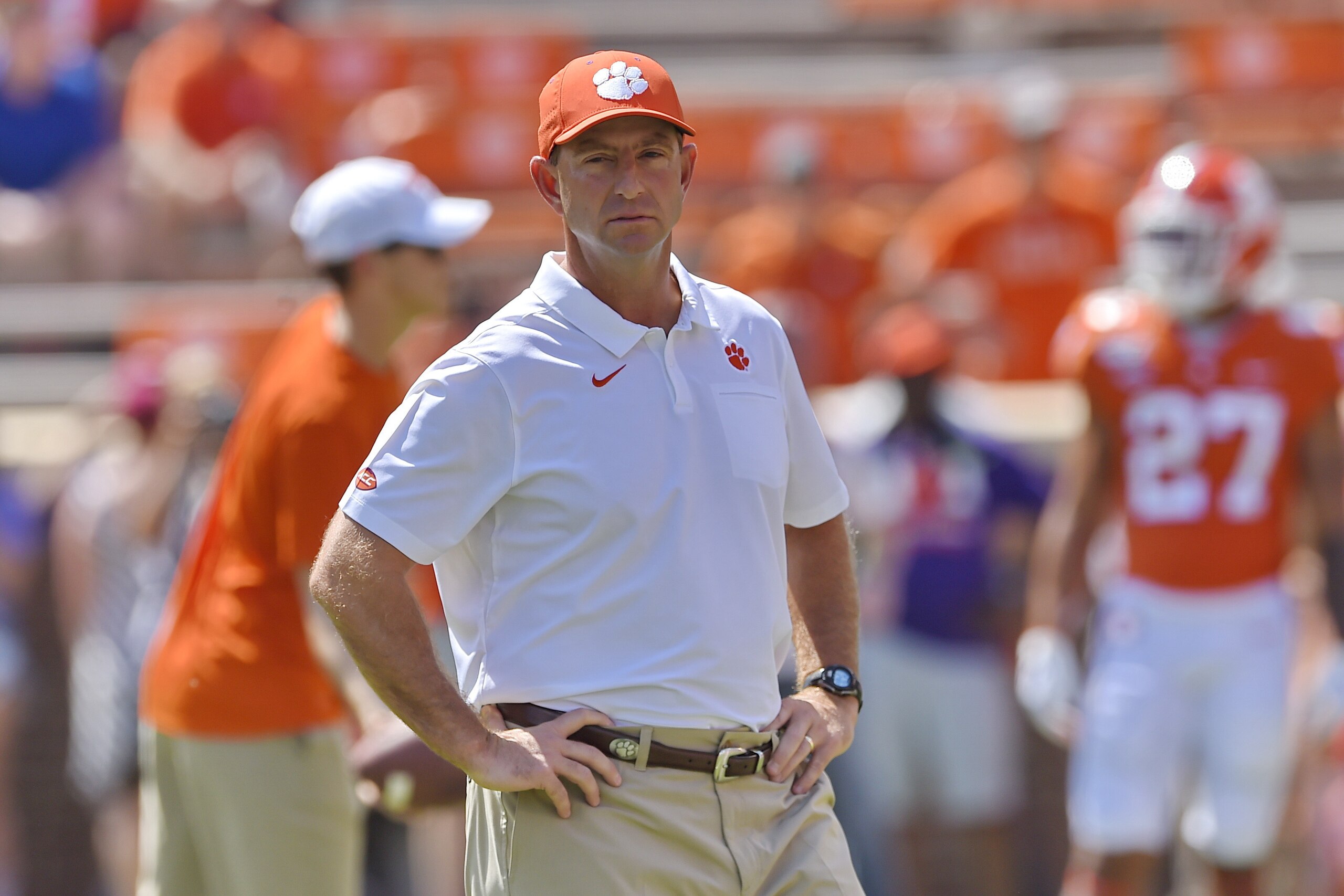 Clemson head coach Dabo Swinney watches his players warm up before the start of an NCAA college football game against Texas A&M Saturday, Sept. 7, 2019, in Clemson, S.C. Clemson won 24-10. (AP Photo/Richard Shiro)