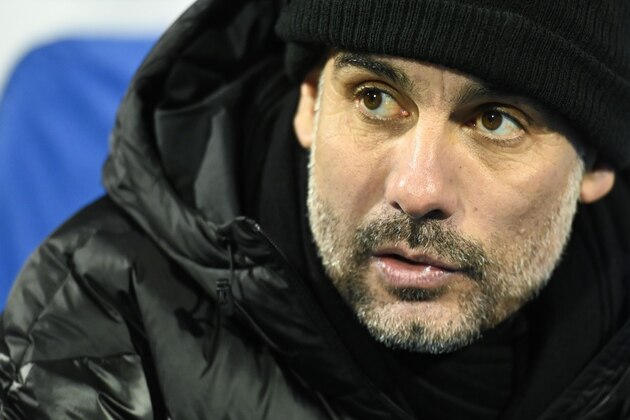 Manchester City's Spanish manager Pep Guardiola looks on during the UEFA Champions League Group C football match between GNK Dinamo Zagreb and Manchester City FC at the Maksimir Stadium in Zagreb on December 11, 2019. (Photo by Denis LOVROVIC / AFP) (Photo by DENIS LOVROVIC/AFP via Getty Images)