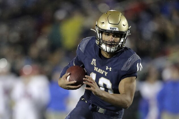 Navy quarterback Malcolm Perry scrambles against SMU during the second half of an NCAA college football game, Saturday, Nov. 23, 2019, in Annapolis, Md. (AP Photo/Julio Cortez)