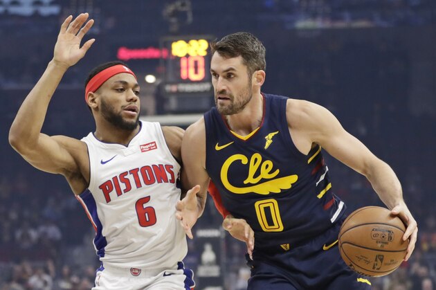Cleveland Cavaliers' Kevin Love (0) drives against Detroit Pistons' Bruce Brown (6) in the first half of an NBA basketball game, Tuesday, Dec. 3, 2019, in Cleveland. (AP Photo/Tony Dejak)