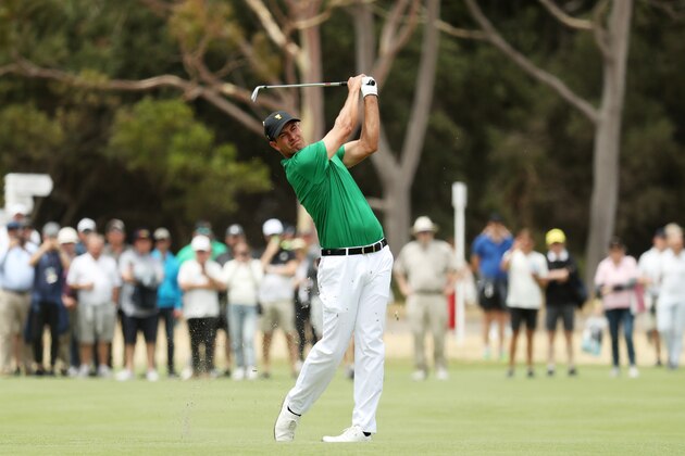 MELBOURNE, AUSTRALIA - DECEMBER 13: Adam Scott of Australia and the International team plays a shot on the 16th hole during Friday foursome matches on day two of the 2019 Presidents Cup at Royal Melbourne Golf Course on December 13, 2019 in Melbourne, Australia. (Photo by Rob Carr/Getty Images)