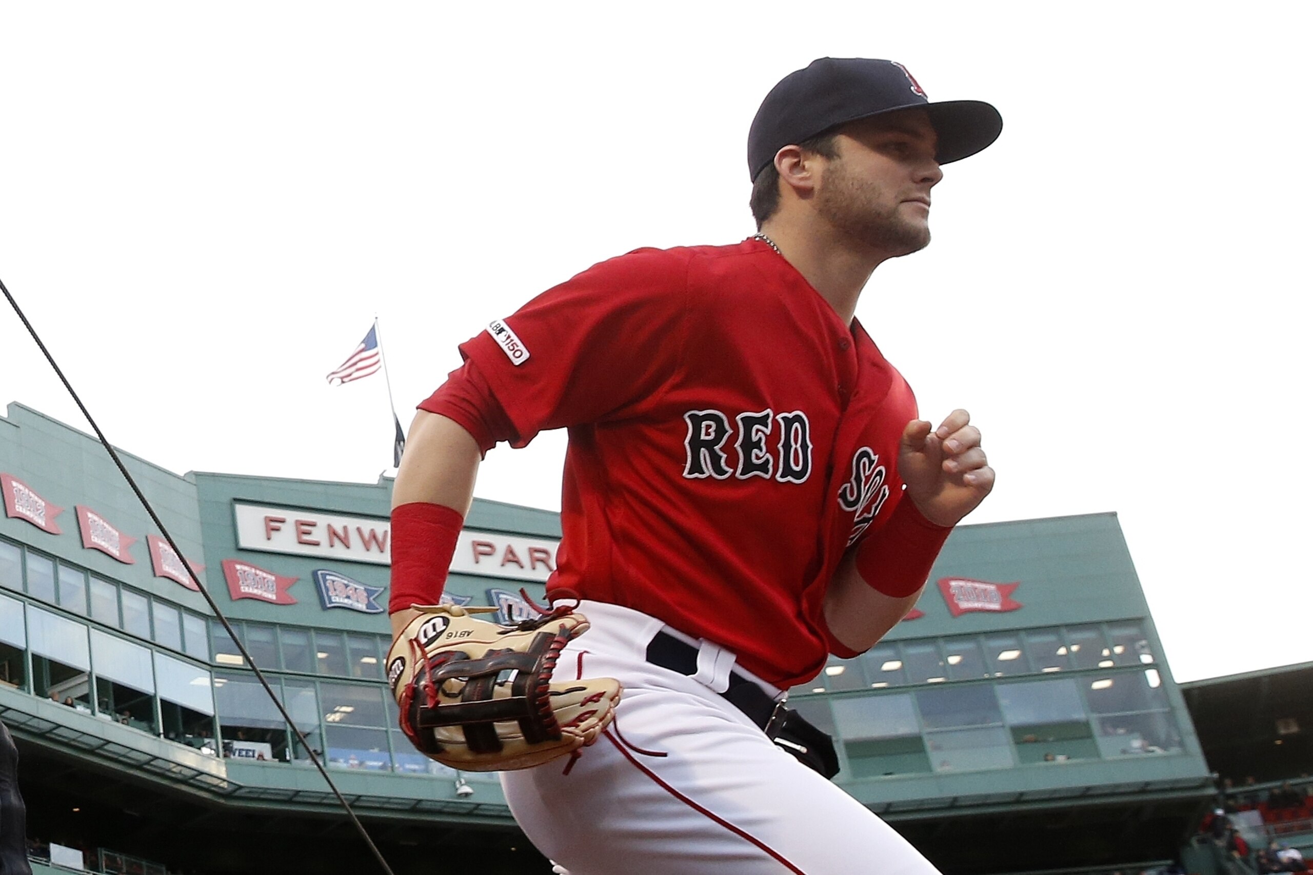 Boston Red Sox's Andrew Benintendi takes the field during the first inning of a baseball game against the Seattle Mariners in Boston, Friday, May 10, 2019. (AP Photo/Michael Dwyer)