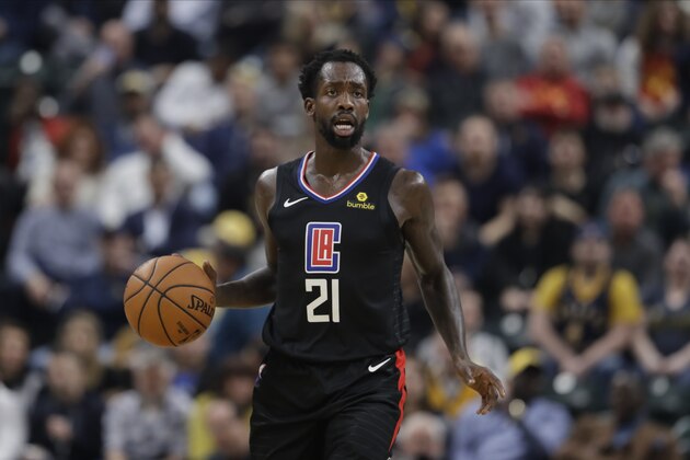 Los Angeles Clippers' Patrick Beverley (21) dribbles during the first half of an NBA basketball game against the Indiana Pacers, Monday, Dec. 9, 2019, in Indianapolis. (AP Photo/Darron Cummings)