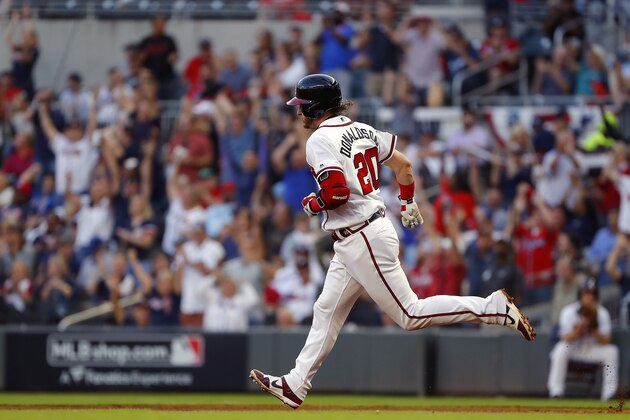 ATLANTA, GEORGIA - OCTOBER 09:  Josh Donaldson #20 of the Atlanta Braves hits a solo home run against the St. Louis Cardinals during the fourth inning in game five of the National League Division Series at SunTrust Park on October 09, 2019 in Atlanta, Georgia. (Photo by Kevin C. Cox/Getty Images)