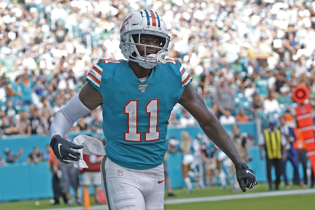 MIAMI GARDENS, FL - DECEMBER 1: DeVante Parker #11 of the Miami Dolphins celebrates after scoring a touchdown against the Philadelphia Eagles during an NFL game on December 1, 2019 at Hard Rock Stadium in Miami Gardens, Florida. The Dolphins defeated the Eagles 37-31. (Photo by Joel Auerbach/Getty Images)