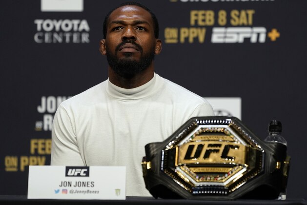 LAS VEGAS, NEVADA - DECEMBER 13:  UFC light heavyweight champion Jon Jones interacts with media during the UFC 247 press conference at T-Mobile Arena on December 13, 2019 in Las Vegas, Nevada. (Photo by Jeff Bottari/Zuffa LLC)