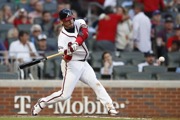 ATLANTA, GEORGIA - OCTOBER 09:  Josh Donaldson #20 of the Atlanta Braves hits a solo home run against the St. Louis Cardinals during the fourth inning in game five of the National League Division Series at SunTrust Park on October 09, 2019 in Atlanta, Georgia. (Photo by Todd Kirkland/Getty Images)
