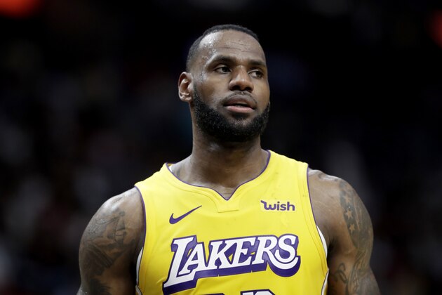 Los Angeles Lakers forward LeBron James (23) stands on the court during the second half of an NBA basketball game against the Miami Heat, Friday, Dec. 13, 2019, in Miami. The Lakers won 113-110. (AP Photo/Lynne Sladky)