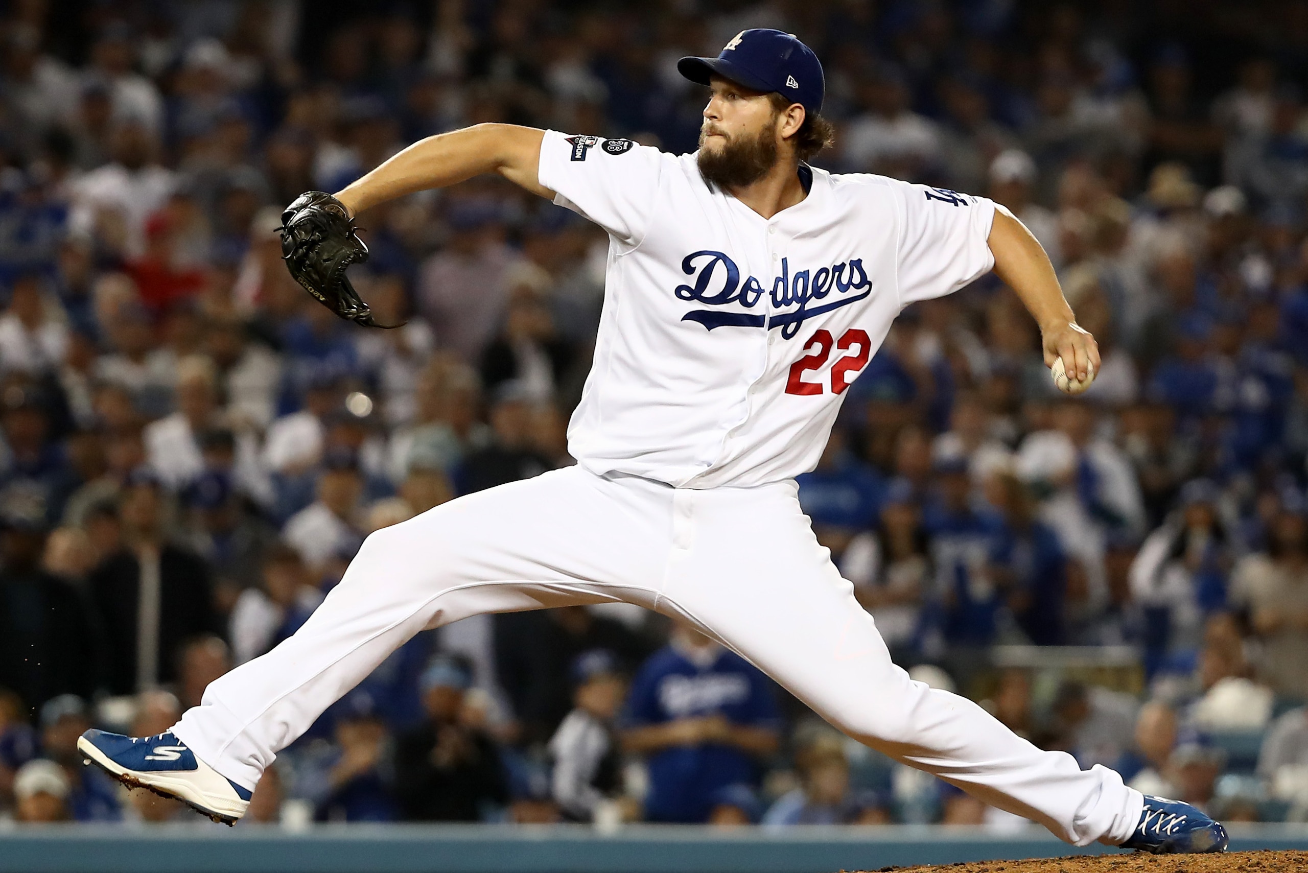 LOS ANGELES, CALIFORNIA - OCTOBER 09: Clayton Kershaw #22 of the Los Angeles Dodgers pitches in relief in the seventh inning of game five of the National League Division Series against the Washington Nationals at Dodger Stadium on October 09, 2019 in Los Angeles, California. (Photo by Sean M. Haffey/Getty Images)