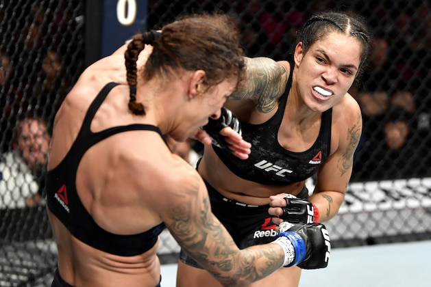 LAS VEGAS, NEVADA - DECEMBER 14:  (R-L) Amanda Nunes of Brazil strikes Germaine de Randamie of Netherlands in their UFC women's bantamweight championship bout during the UFC 245 event at T-Mobile Arena on December 14, 2019 in Las Vegas, Nevada. (Photo by Jeff Bottari/Zuffa LLC)