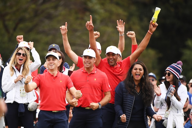 MELBOURNE, AUSTRALIA - DECEMBER 15:  Justin Thomas of the United States team, Gary Woodland of the United States team, Tony Finau of the United States team, Xander Schauffele of the United States team and Webb Simpson of the United States team celebrate winning the Presidents Cup during Sunday Singles matches on day four of the 2019 Presidents Cup at Royal Melbourne Golf Course on December 15, 2019 in Melbourne, Australia. (Photo by Quinn Rooney/Getty Images)